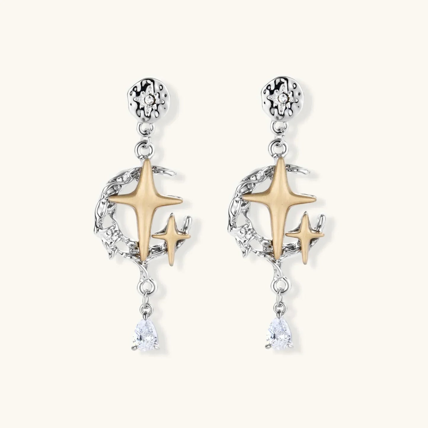 Celestial Star Drops mixed-metal earrings with silver discs, gold stars, and pear-cut zirconia from Najera Studio