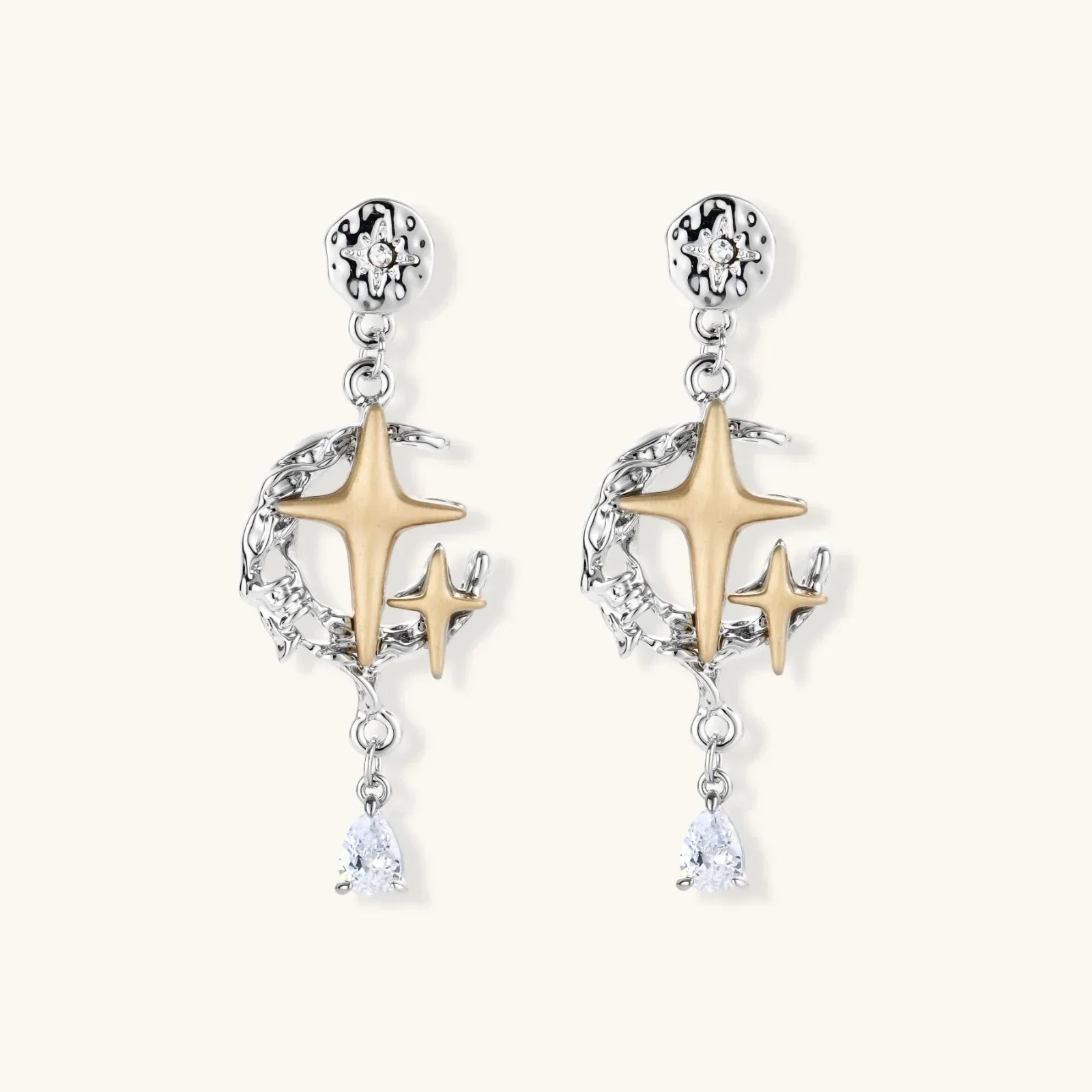 Celestial Star Drops mixed-metal earrings with silver discs, gold stars, and pear-cut zirconia from Najera Studio