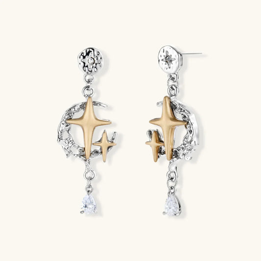 Celestial Star Drops mixed-metal earrings with hammered silver, gold star, silver vines, and pear-cut zirconia by Najera Studio