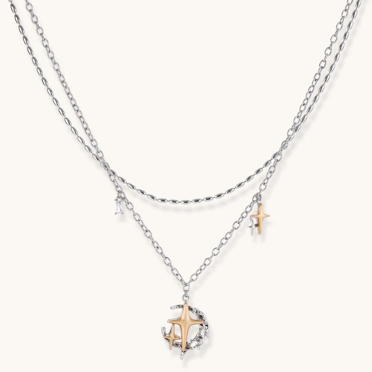 Layered silver-tone necklace set featuring star charms and crescent moon pendant with eco-friendly zinc alloy construction