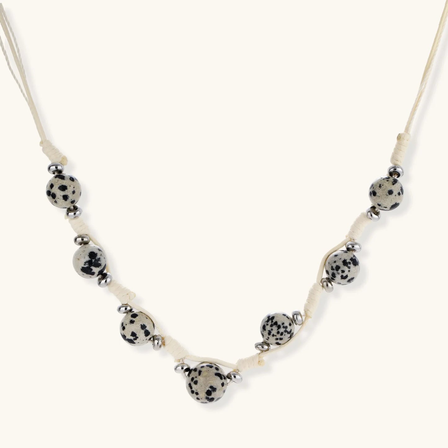 Dalmatian Dreams Necklace with speckled beads and adjustable cream cord from Najera Studio