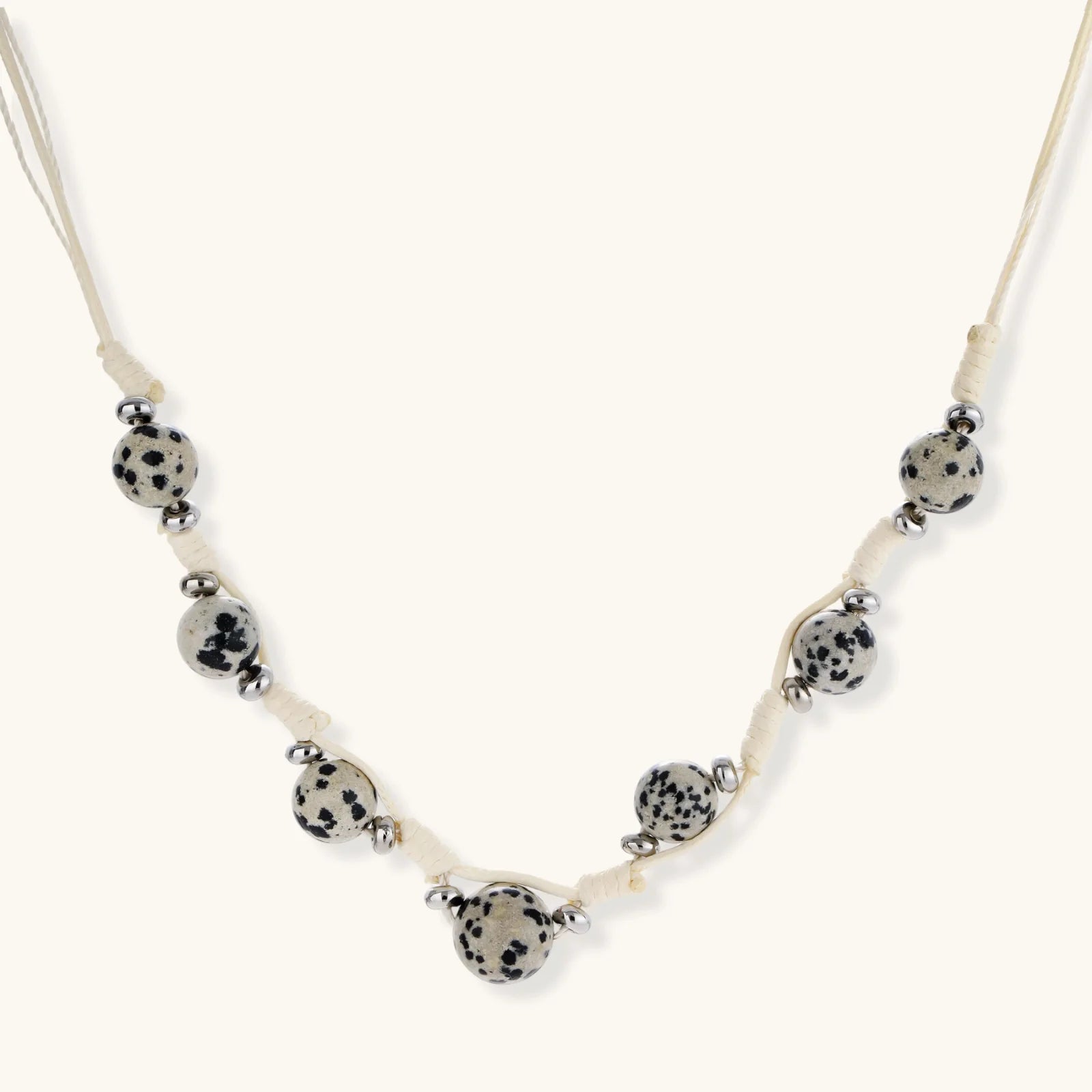 Dalmatian Dreams Necklace with speckled beads and adjustable cream cord from Najera Studio