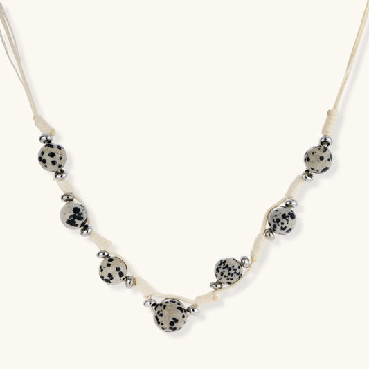 Dalmatian Dreams Necklace with speckled beads and adjustable cream cord from Najera Studio