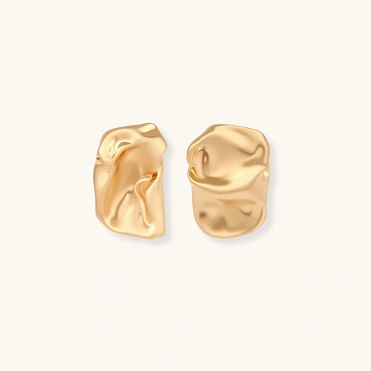 Sculptural wave earrings in crumpled gold with eco-zinc alloy and sterling silver posts by Najera Studio