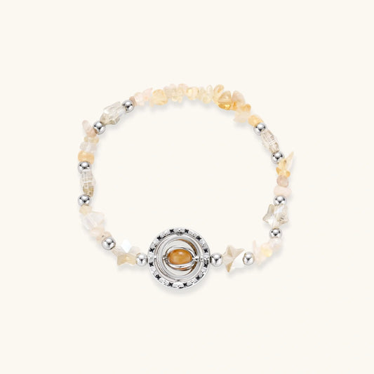 Golden Hour Energy Bracelet with citrine chips, amber-toned stone, star-cut crystals, and silver beads by Najera Studio