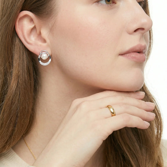 White gold plated Pearl Orbit Studs with freshwater pearls and sparkling stone curves by Najera Studio